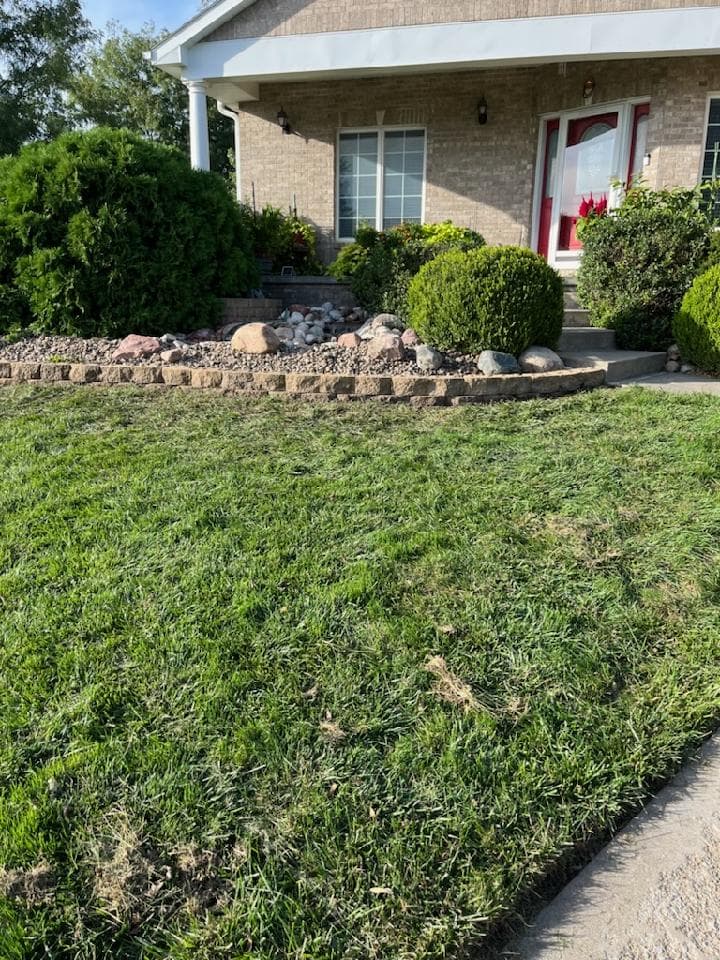 Retaining Wall Rebuild Fixes Shifting Curb Appeal in Lincoln image