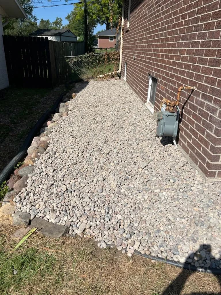 River Rock Landscape Bed Replacement in Lincoln image